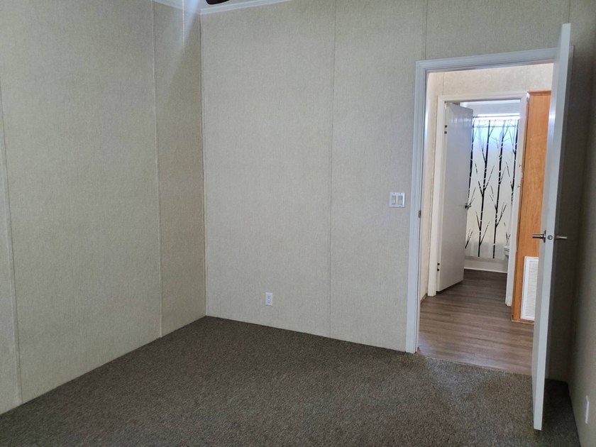 THIS HOME IS ON LEASED LAND WITH A MONTHLY LOT RENT OF $542 AND - photo 58