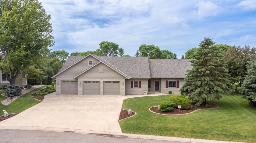 This stately patio home built by Larson Builders overlooks the - photo 33