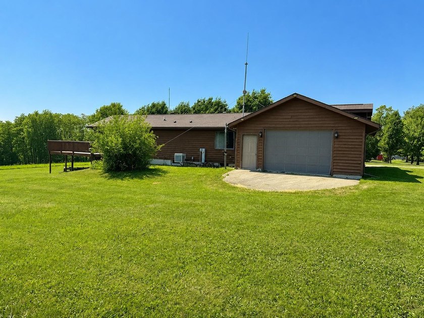 Nestled on 2.93 picturesque acres with a wooded backdrop, this - photo 5
