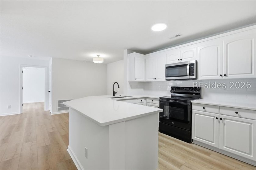 Welcome to The Estates at Westbury! Renovated in 2026! This - photo 7