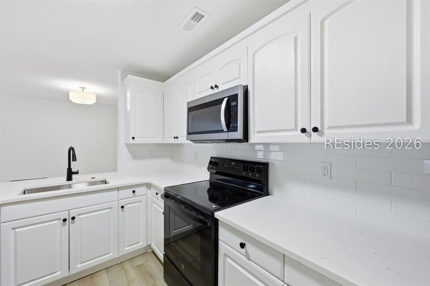 Welcome to The Estates at Westbury! Renovated in 2026! This - photo 9