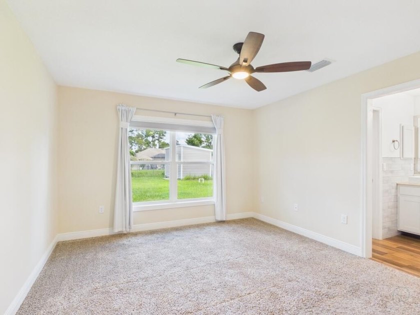 Why wait and build a house when this one is better than new! - photo 11