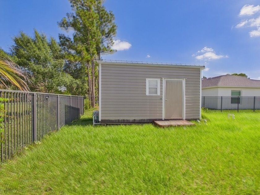 Why wait and build a house when this one is better than new! - photo 32