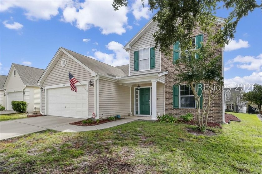 Welcome to this beautifully maintained Cypress Ridge home - photo 2