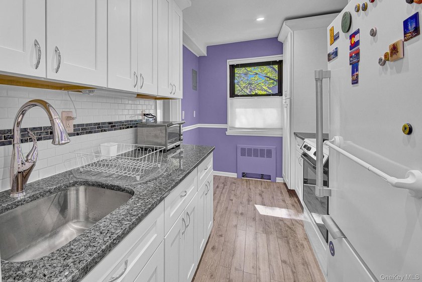 Welcome to this beautifully maintained lower unit, move-in-ready - photo 9