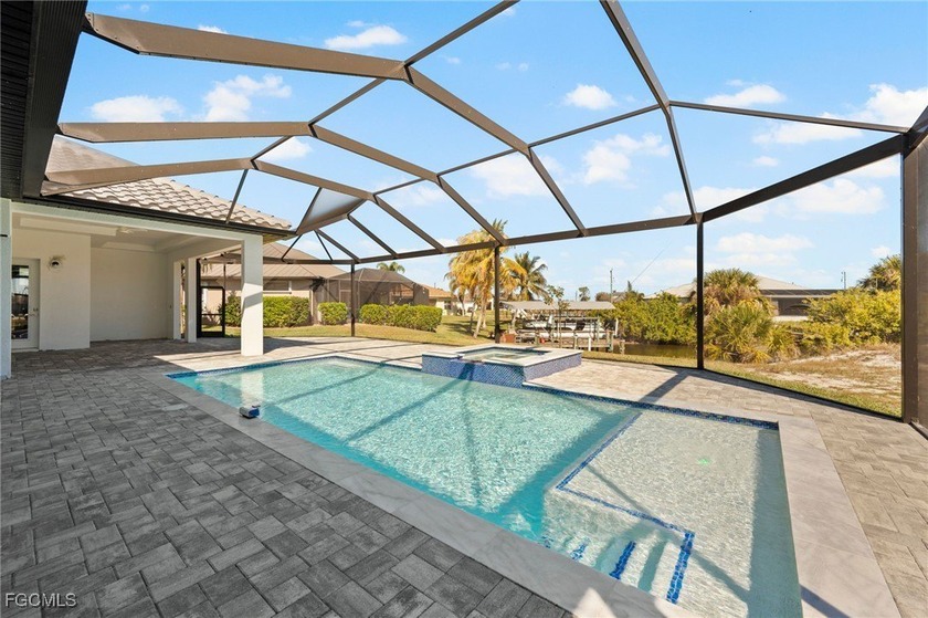 GULF ACCESS, POOL HOME! Custom built and completed in 2024, this - photo 4