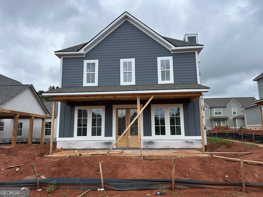Welcome to this cottage-style planning community in the - photo 2