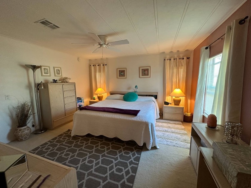 This meticulously maintained 2-bedroom, 2-bath home shines both - photo 13