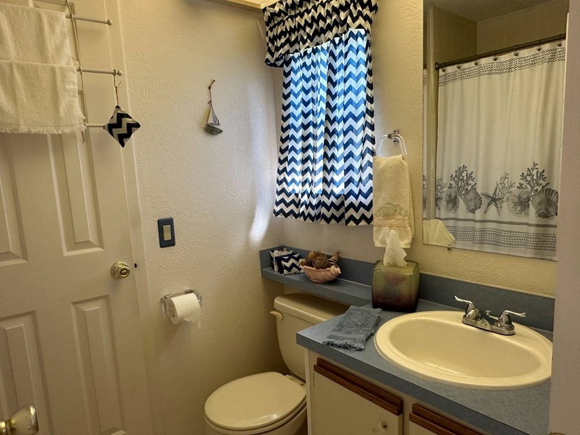 This meticulously maintained 2-bedroom, 2-bath home shines both - photo 14