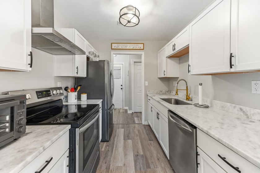 Fully renovated and move-in ready, this beautifully updated - photo 8