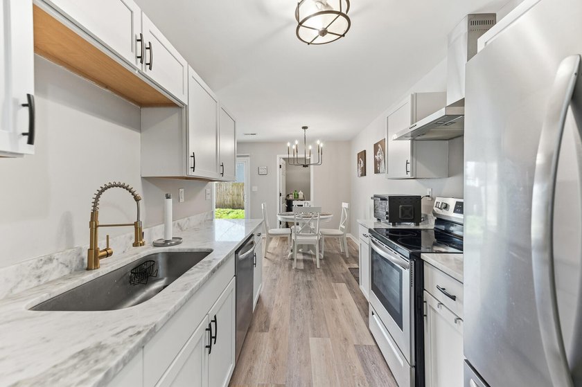 Fully renovated and move-in ready, this beautifully updated - photo 9