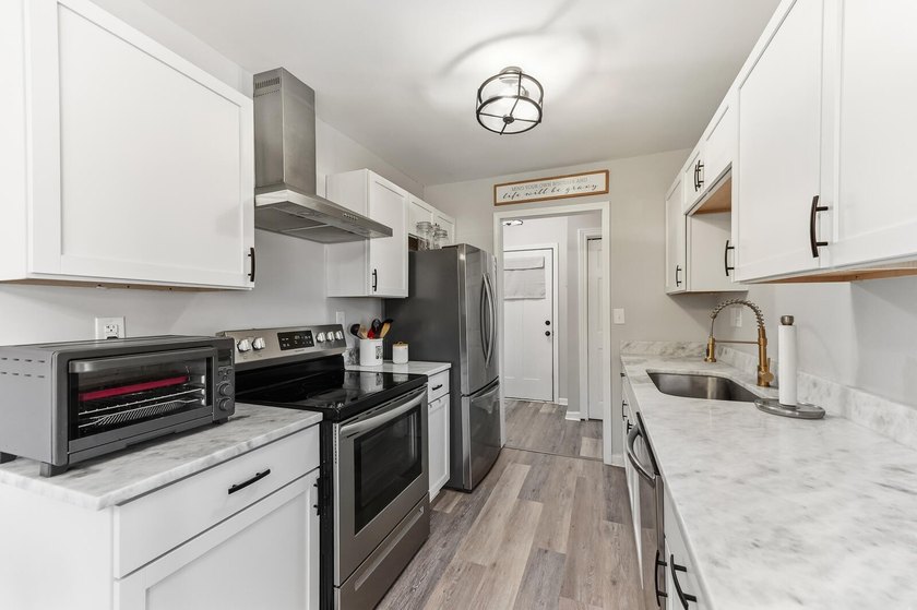 Fully renovated and move-in ready, this beautifully updated - photo 10
