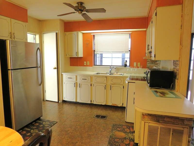 This home offers an open floor plan with spacious kitchen - photo 3