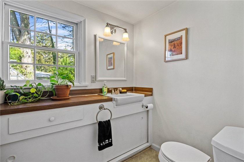 This Brighton Colonial is in a highly desirable neighborhood - photo 25