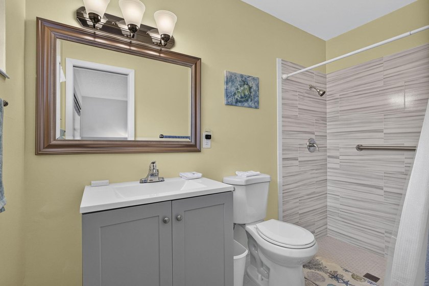 Welcome to this beautifully remodeled 2-bed, 2-bath villa - photo 25