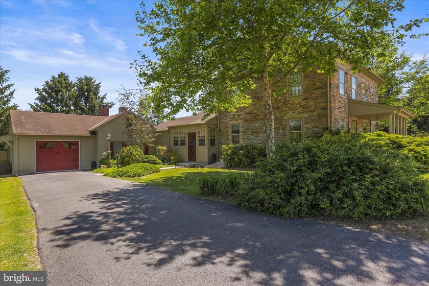 Check out this beautifully kept historical stone home! Both the - photo 8