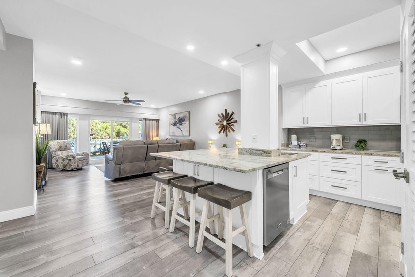 This gorgeous condo has been completely remodeled. Stunning open - photo 4