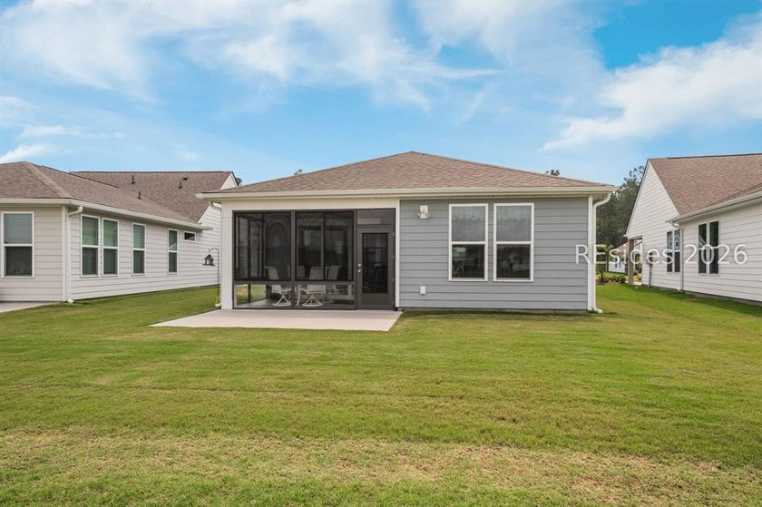 Nestled on a premium lot with a beautiful, serene lagoon view - photo 18