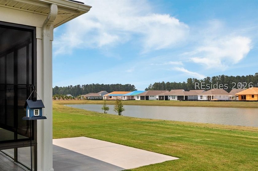 Nestled on a premium lot with a beautiful, serene lagoon view - photo 21