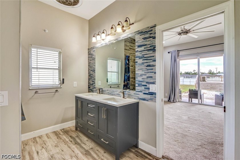 Solidly built 1998 concrete-block home on a rare three-lot - photo 19