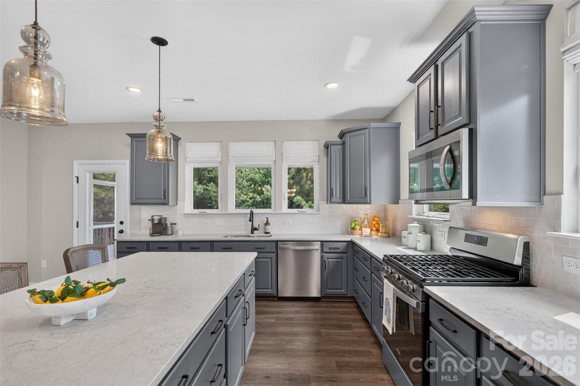 Perfectly positioned with breathtaking lake views and - photo 6