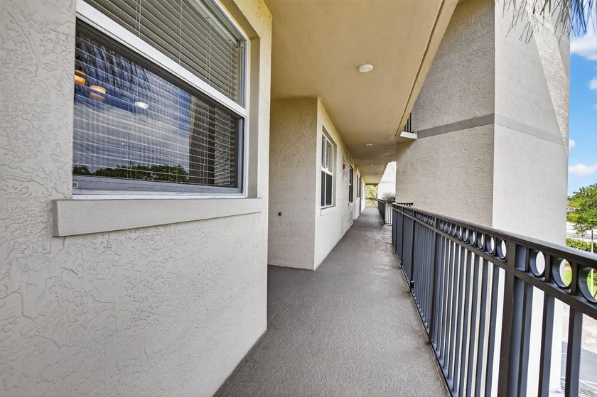 Stunning 2BR/2BA deluxe condo in the heart of SE Boca! Nestled - photo 3