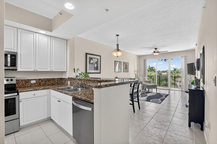 Stunning 2BR/2BA deluxe condo in the heart of SE Boca! Nestled - photo 6
