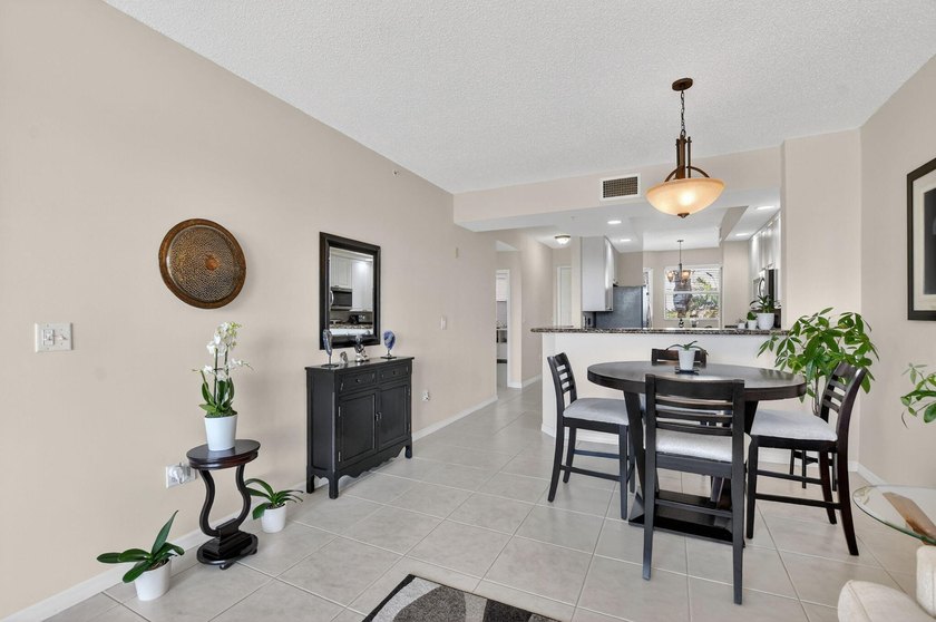 Stunning 2BR/2BA deluxe condo in the heart of SE Boca! Nestled - photo 9