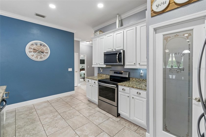 Welcome to your dream home, perfectly situated on a spacious - photo 12