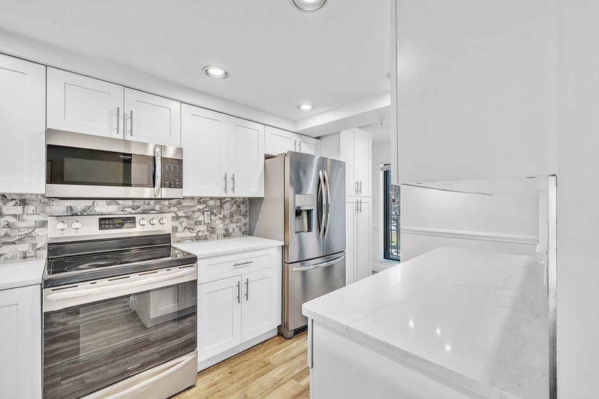 Beautifully updated 2-bedroom, 2-bath condo located in the - photo 12