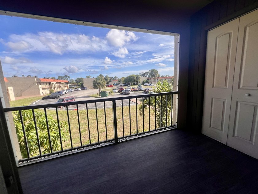 FOR SALE-Second floor condo 2 bedroom 1 bath. AC and Water - photo 16