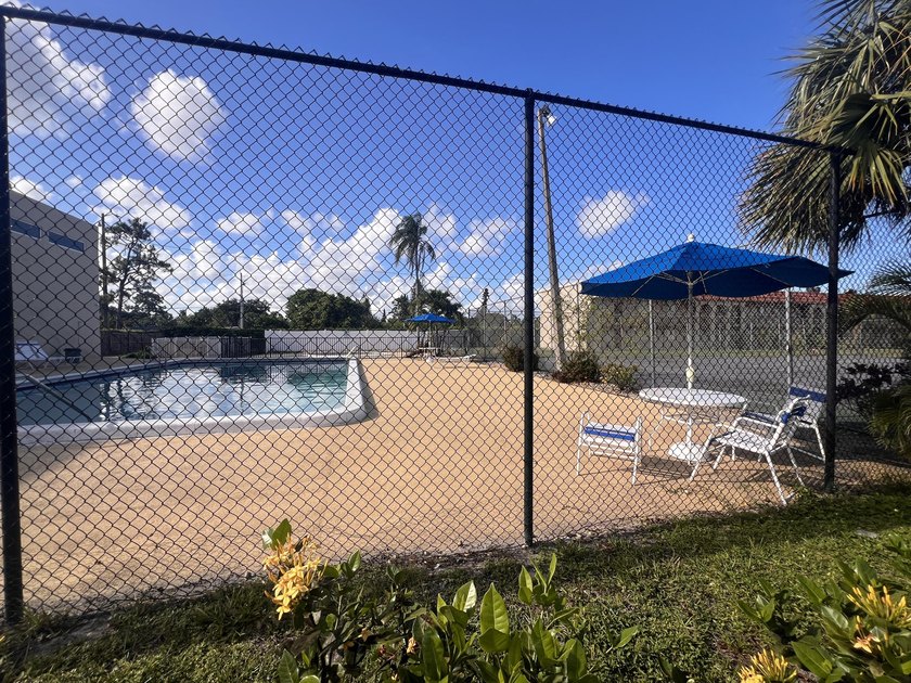 FOR SALE-Second floor condo 2 bedroom 1 bath. AC and Water - photo 23