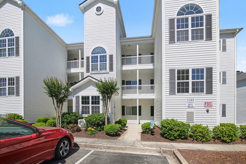 Enjoy beautiful golf course views from this bright and spacious - photo 32