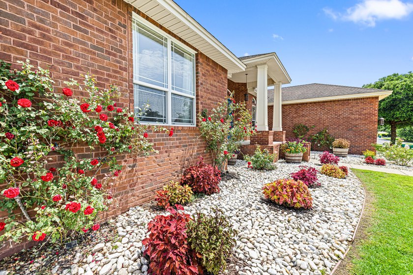 Before you reach the front door at 335 Grove Park Drive, the - photo 5