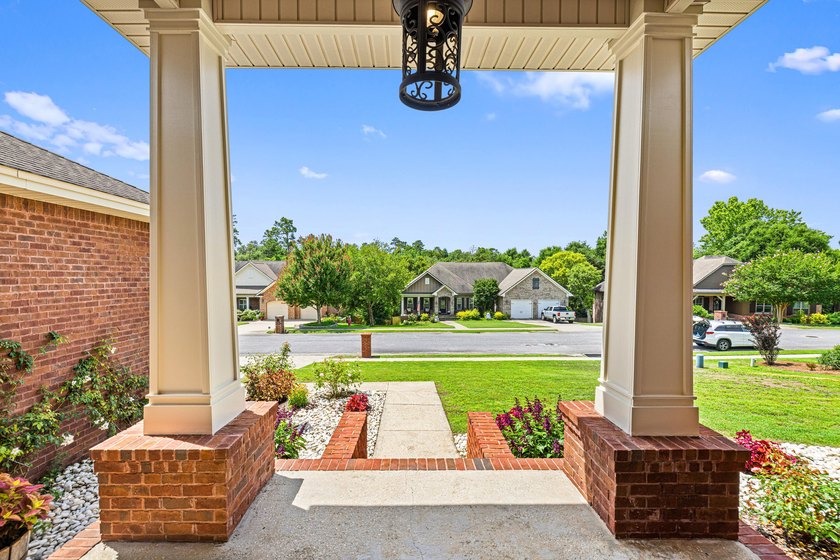 Before you reach the front door at 335 Grove Park Drive, the - photo 9