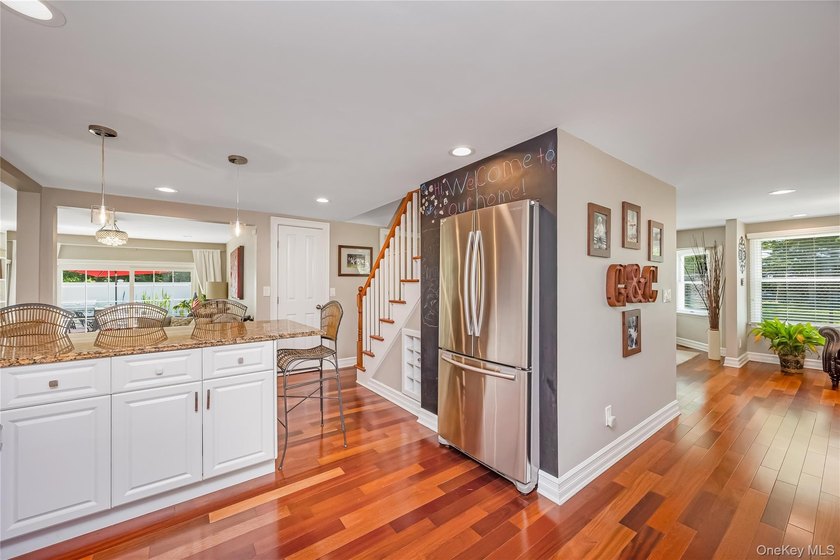 Welcome to this beautifully updated expanded Cape nestled in the - photo 9