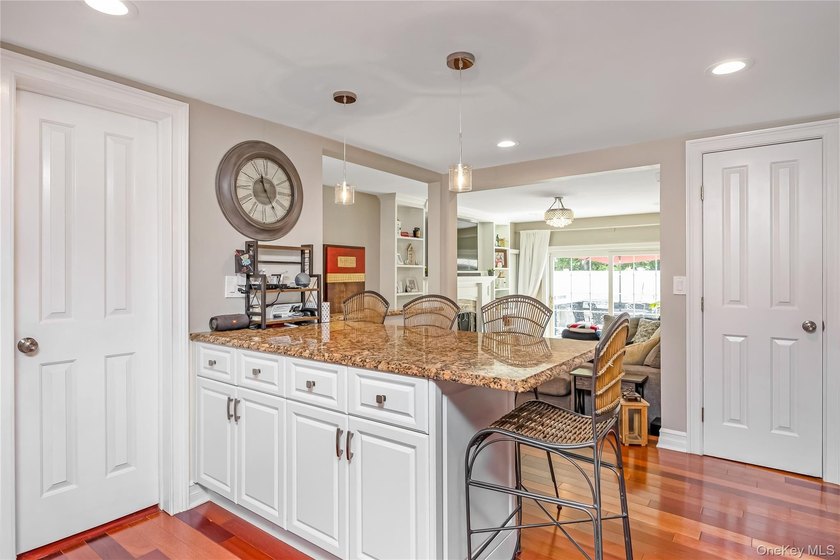 Welcome to this beautifully updated expanded Cape nestled in the - photo 10
