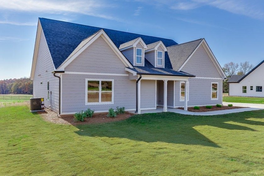 BEST VALUE IN THE COMMUNITY &amp; BEAUTIFUL FLAT 1 ACRE LOT! - photo 3