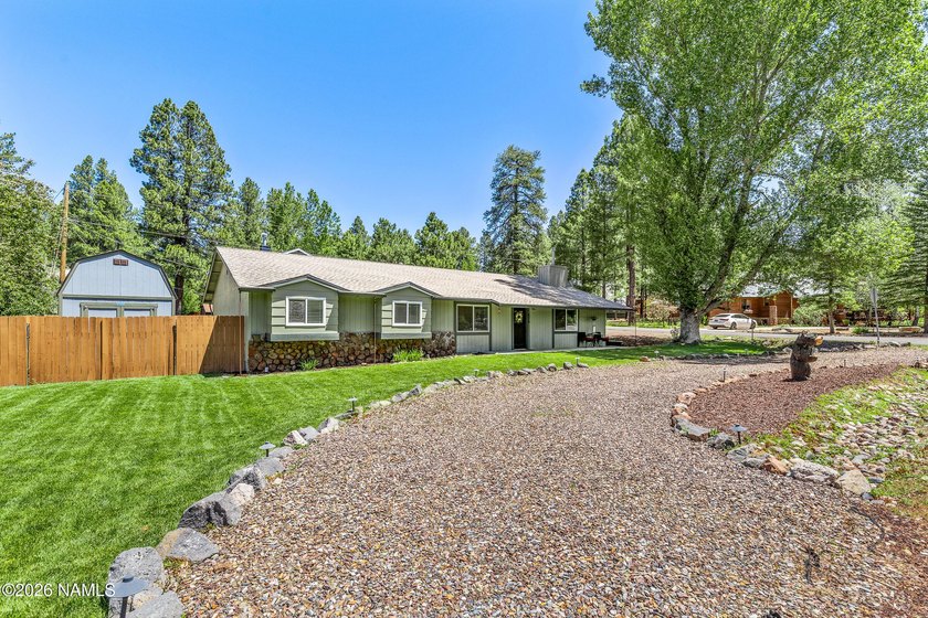 This beautifully updated single-level home offers modern comfort - photo 2