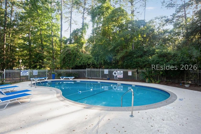 This first-floor 2BR/2BA villa in Palmetto Commons presents a - photo 8