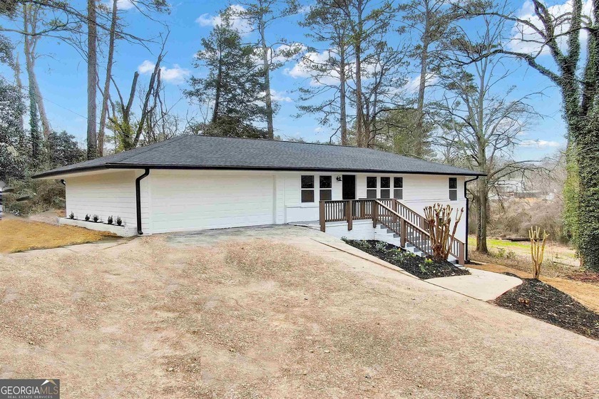 This recently renovated to the studs property is the perfect - photo 12