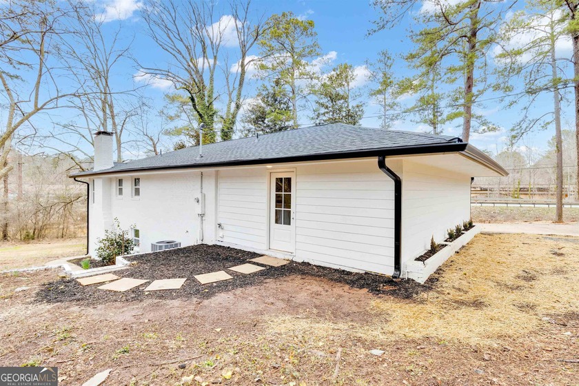 This recently renovated to the studs property is the perfect - photo 13