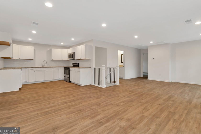 This recently renovated to the studs property is the perfect - photo 16