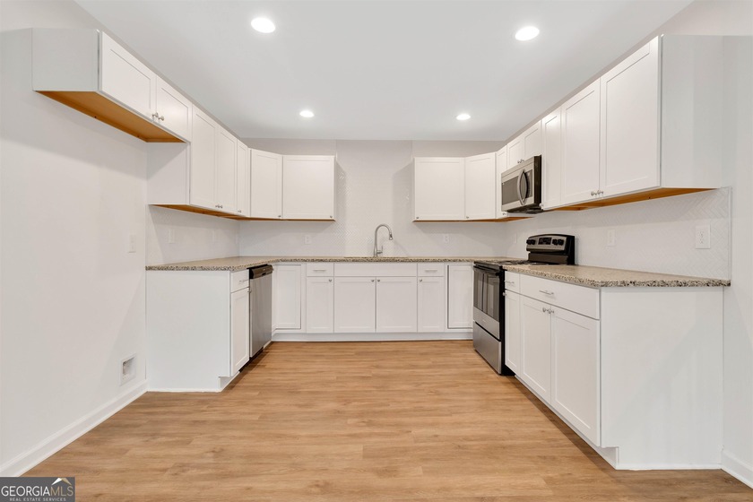 This recently renovated to the studs property is the perfect - photo 19