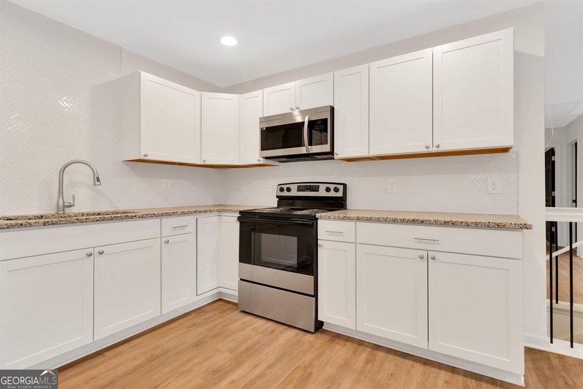 This recently renovated to the studs property is the perfect - photo 24
