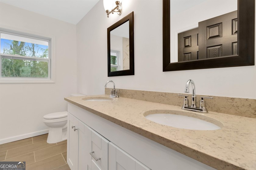 This recently renovated to the studs property is the perfect - photo 26