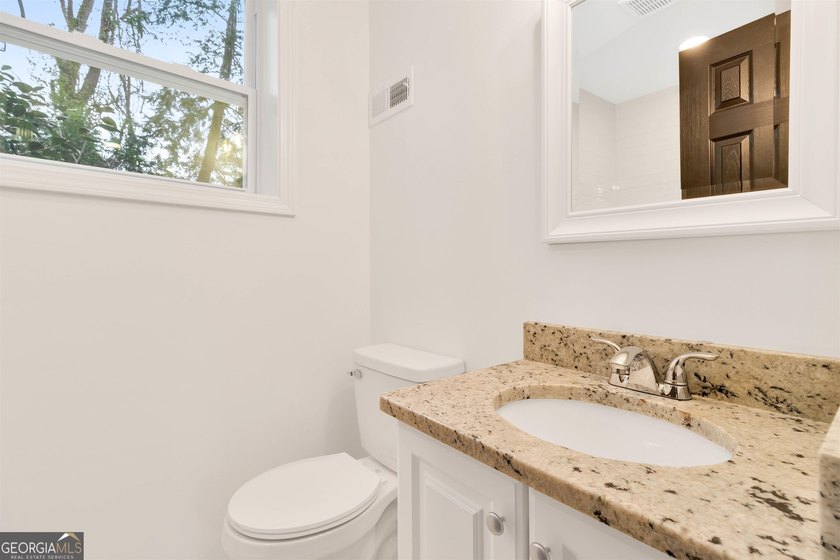 This recently renovated to the studs property is the perfect - photo 29