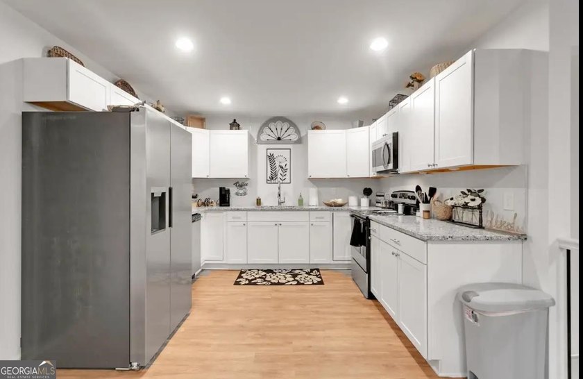 This recently renovated to the studs property is the perfect - photo 40