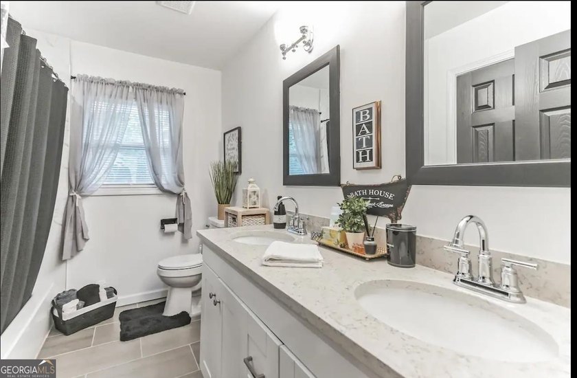 This recently renovated to the studs property is the perfect - photo 44