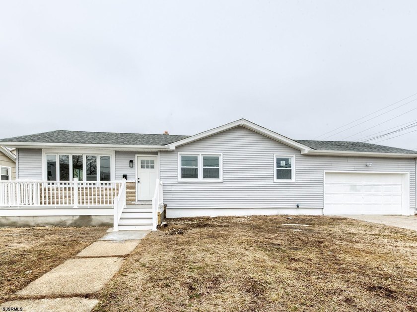 Welcome home on Hamilton. This fully remodeled and somewhat - photo 3